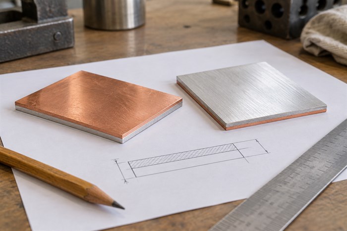 Copper-aluminium sheet samples beside a layer sketch for an RFQ